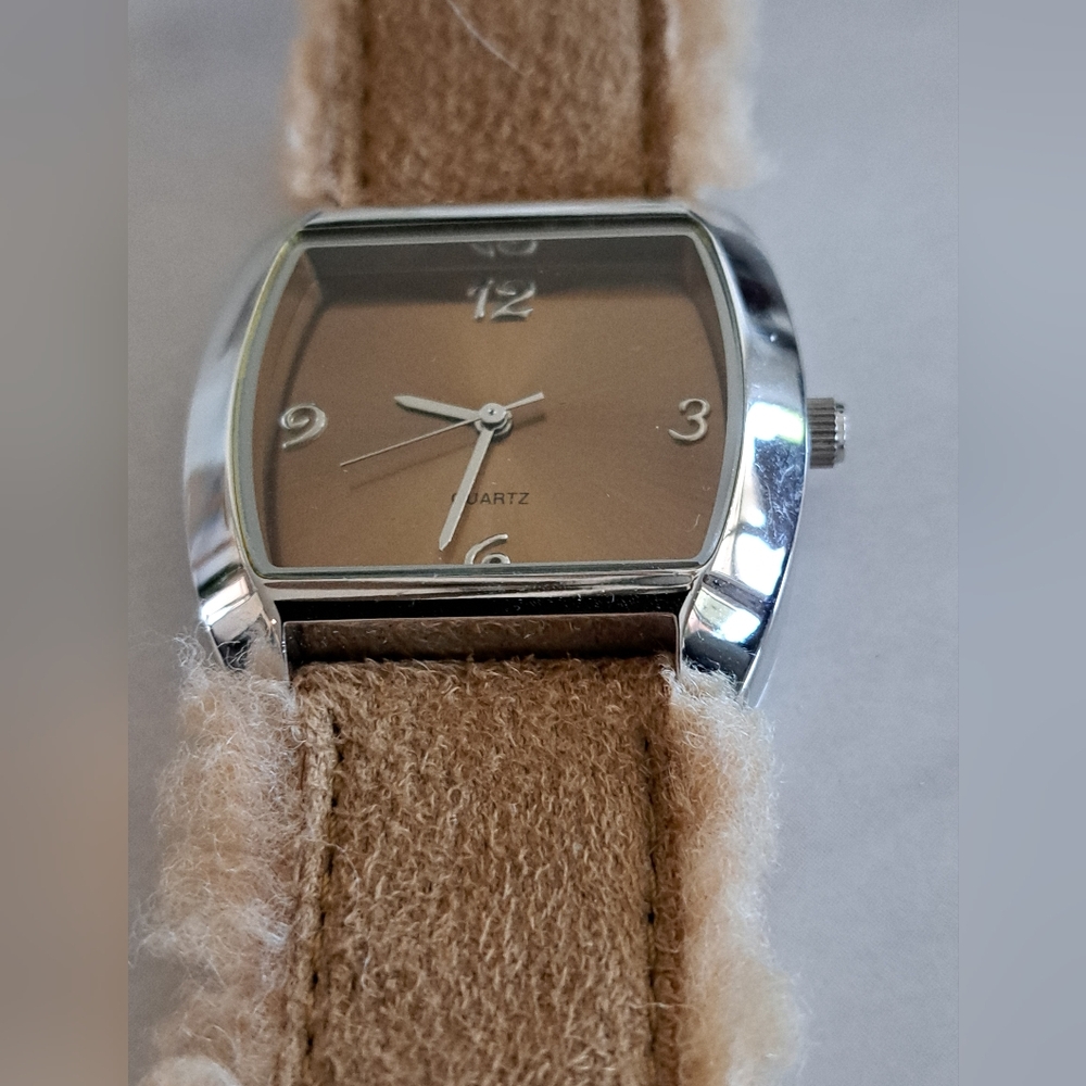 Silver and Tan Watch with Fuzzy Brown Strap